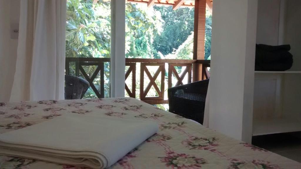 Suíte com Vista do Jardim