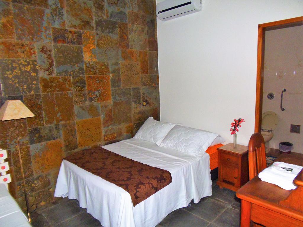 Quarto Duplo