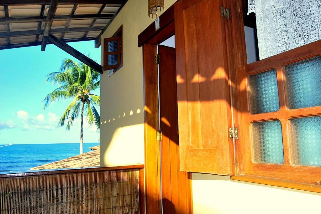 Quarto Quádruplo com Vista Lateral do Mar