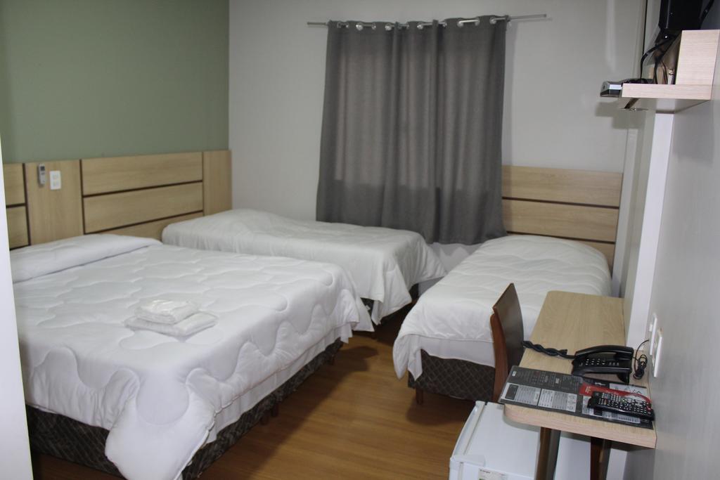 Quarto Quádruplo Luxo