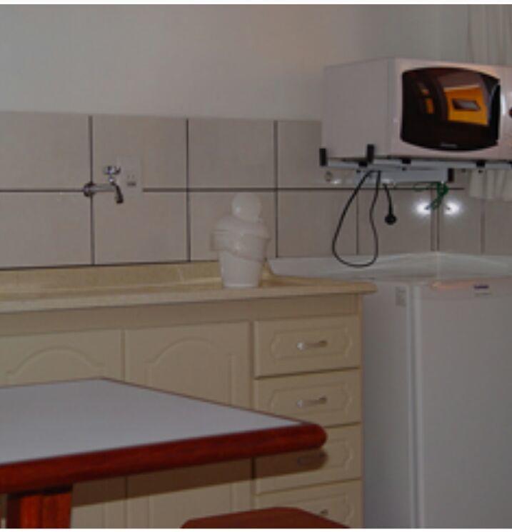 Quarto Triplo com Vista Piscina