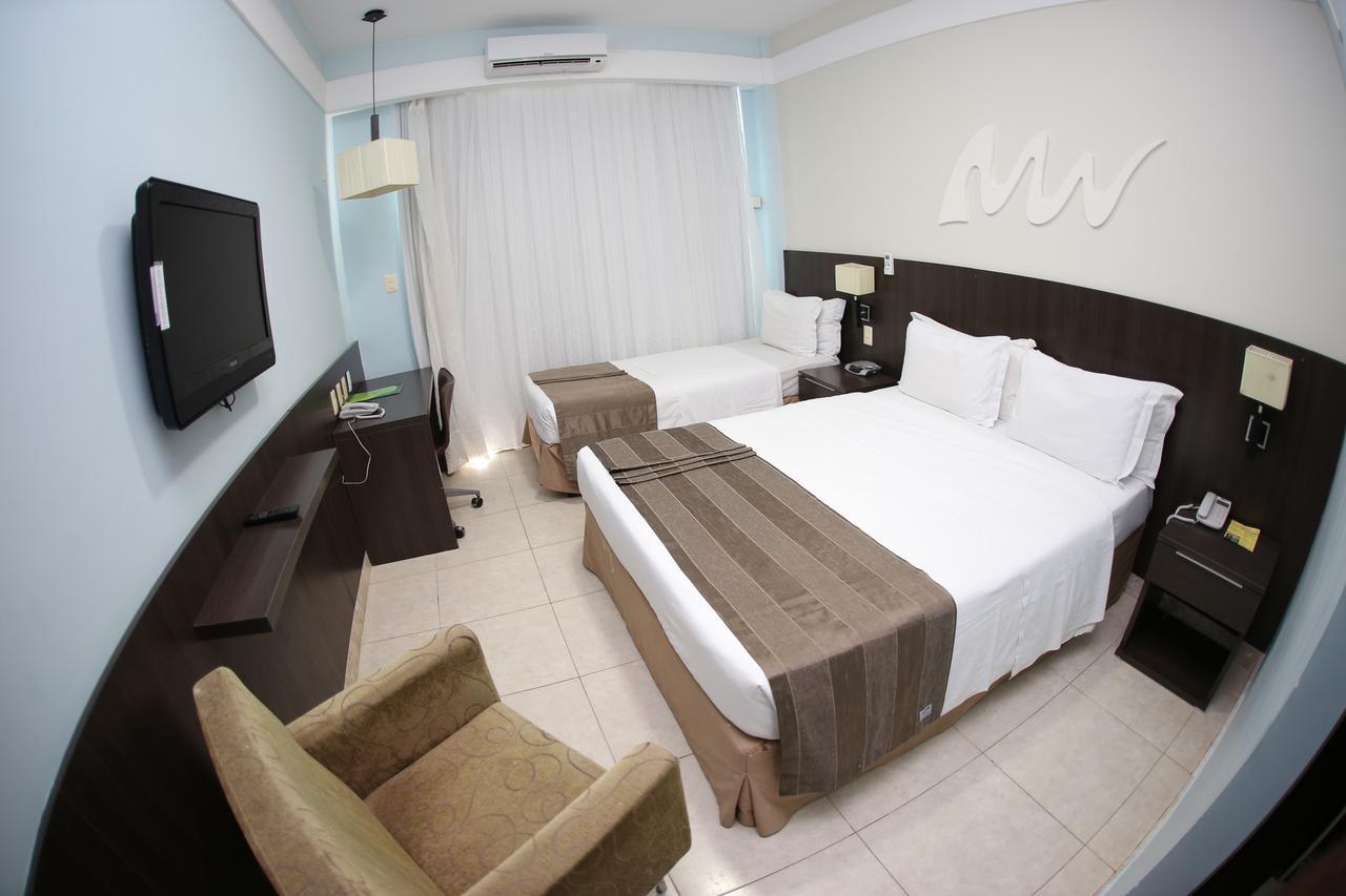 Quarto Familiar com Vista Mar