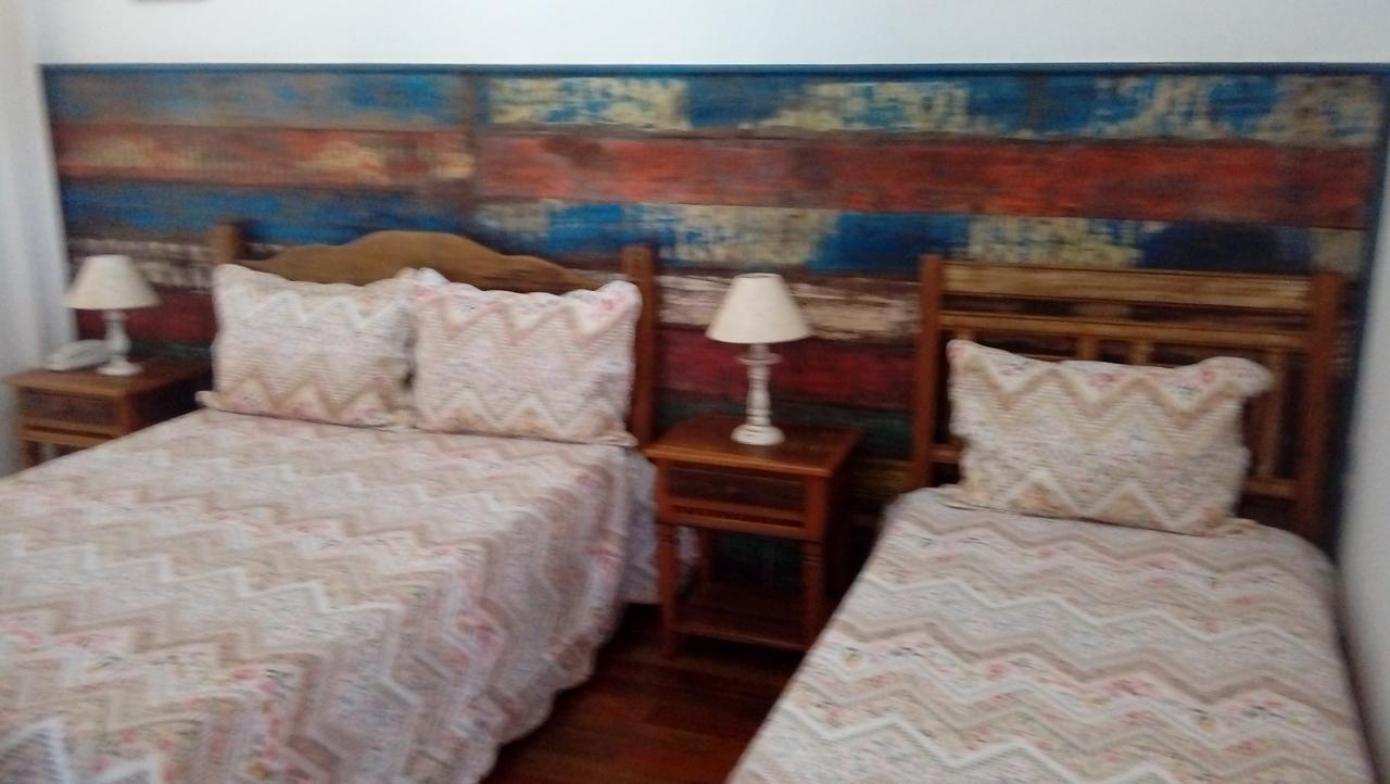 Quarto Triplo com Ar Condicionado