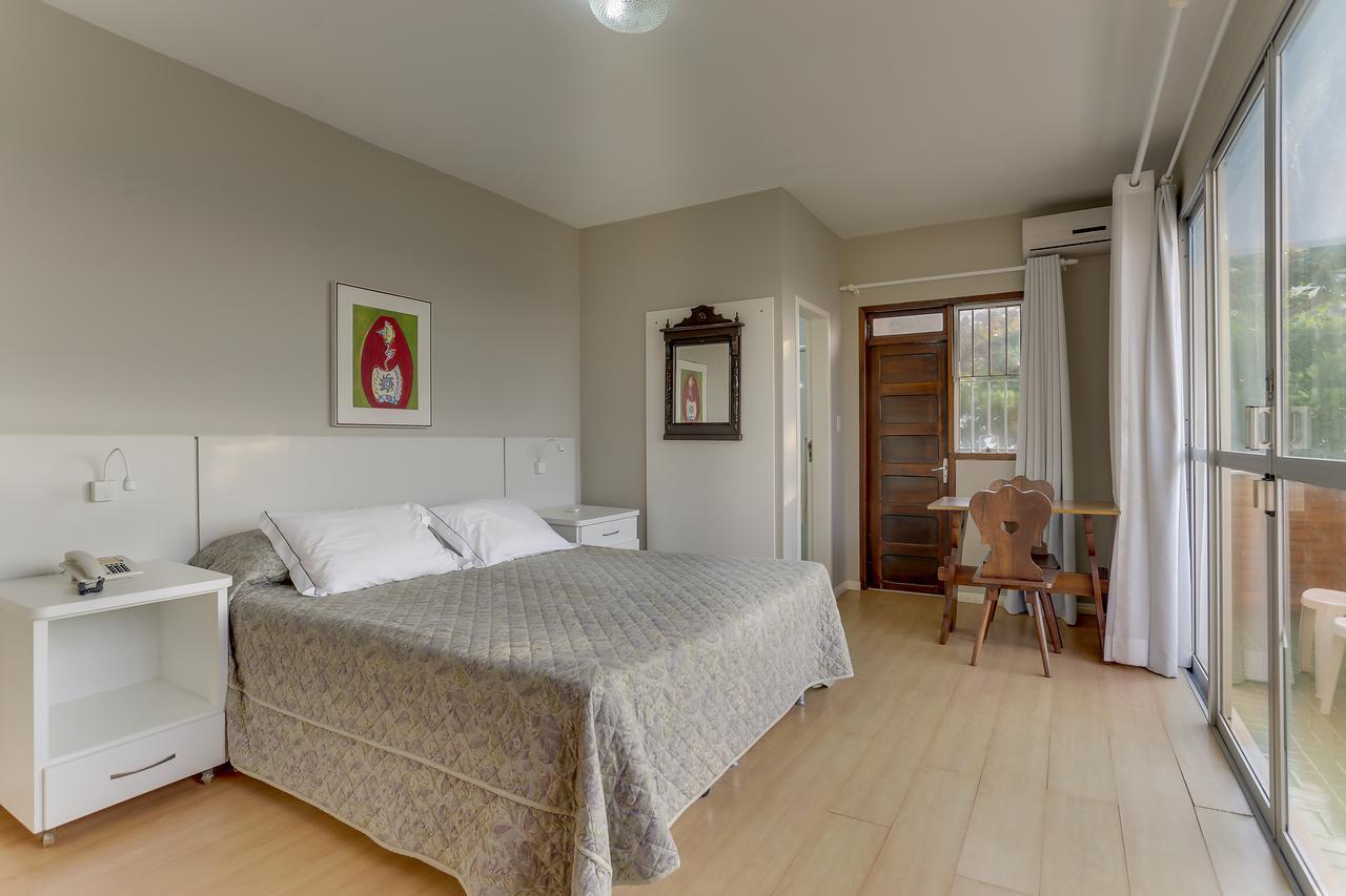 Quarto Triplo Deluxe com Vista Mar
