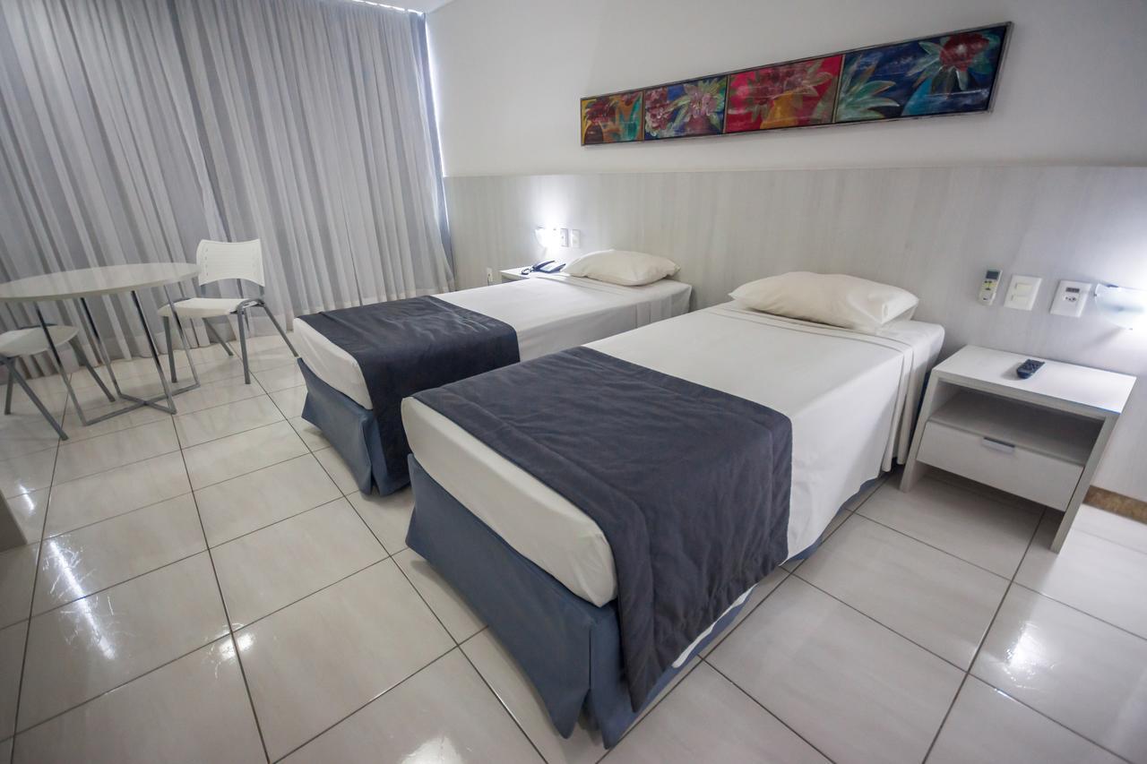 Quarto Duplo com Vista Piscina