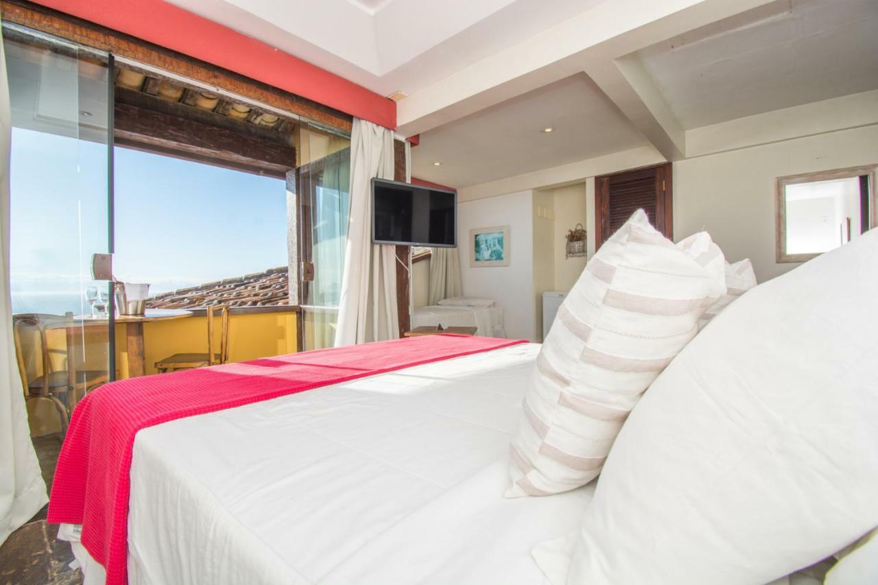 Quarto Triplo com Vista do Mar