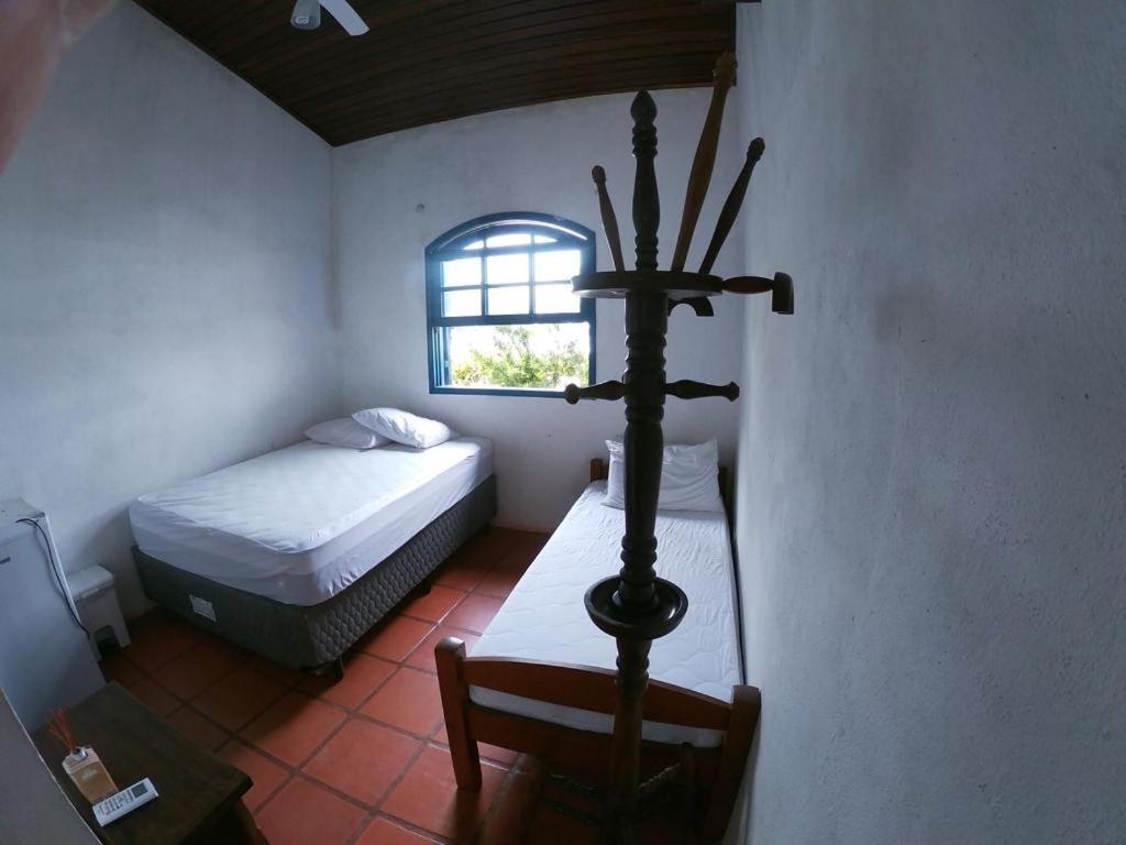 Quarto Triplo com Vista Mar