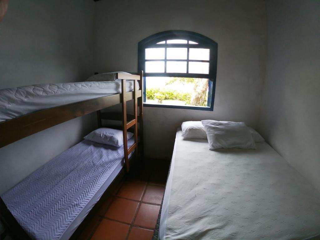 Quarto Quádruplo com Vista Mar