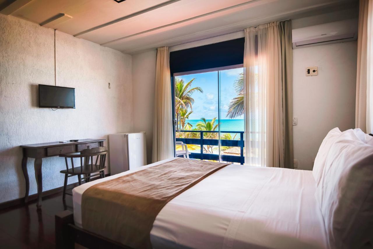 Quarto Triplo Deluxe com Vista Mar
