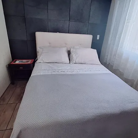 KITNET k1 em TORRES-RS - Na mais bela praia Gaúcha - 2 quartos - Frigobar - micro-ondas - banheiro - ar condicionado split - TV smart 32' - Wi-Fi - Anfitriã Superhost no BnB-3