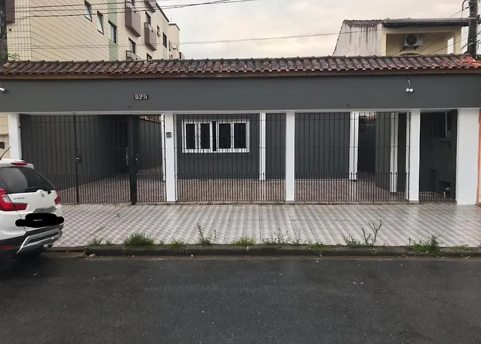 Casa grande e confortável até 16 pessoas com churrasqueira e garagem para 8 carros
