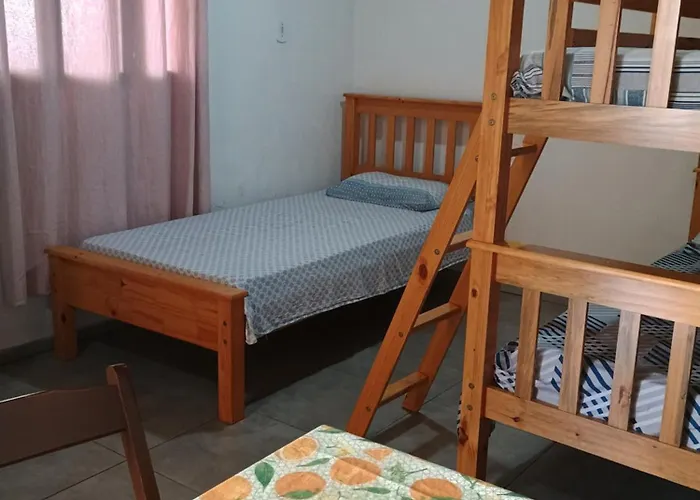 Pousada ideal -casa 3 nos fundos