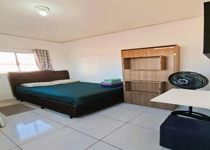 Casa da Fernanda, Suíte Sky Praia Grande , Brasil